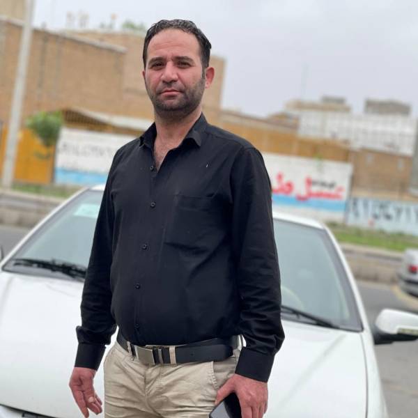 تصویر توحید مددلو